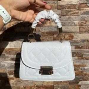 White Ruched Top, Gold Chain Handbag